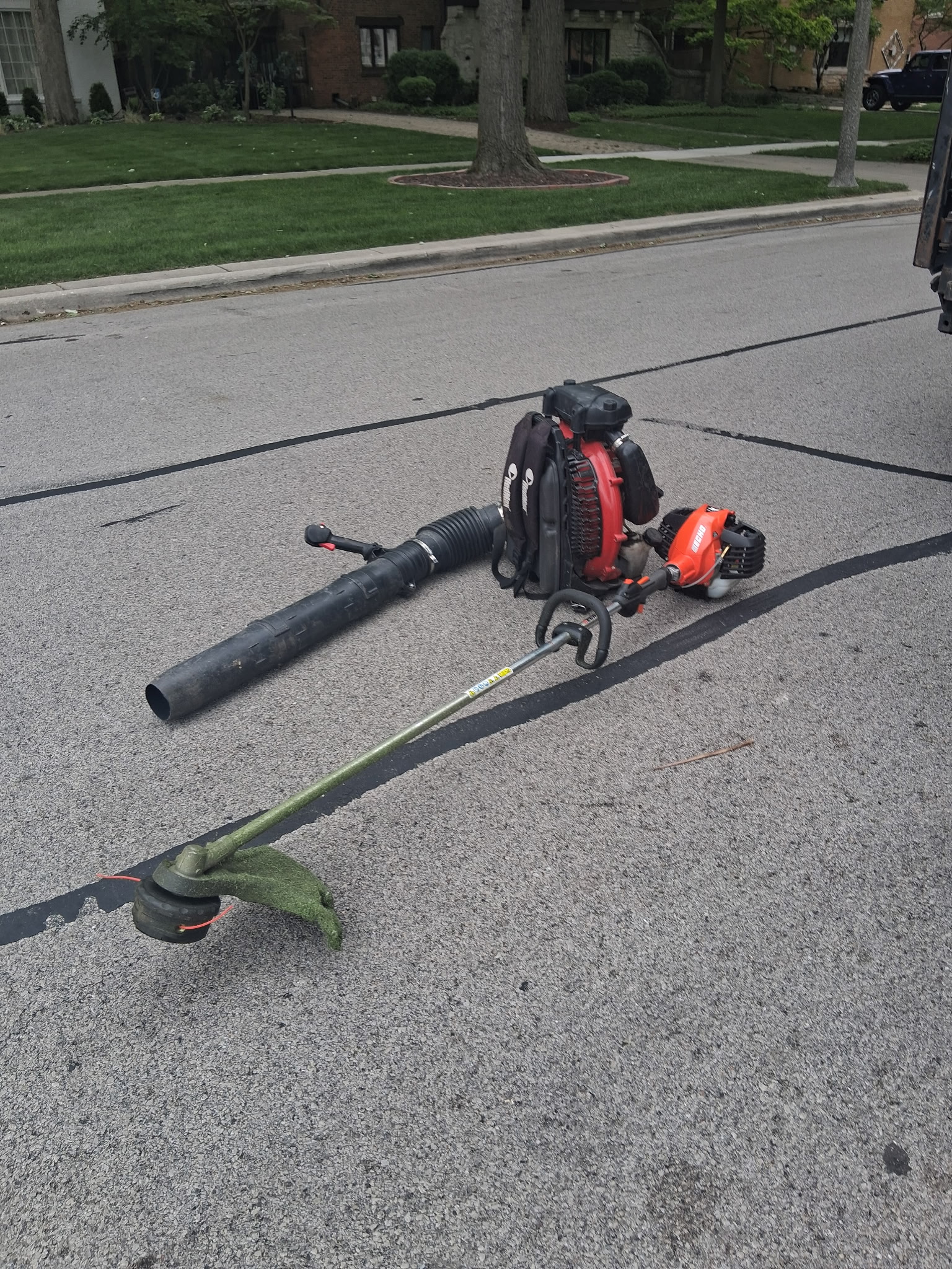 Backpack blower and string trimmer
